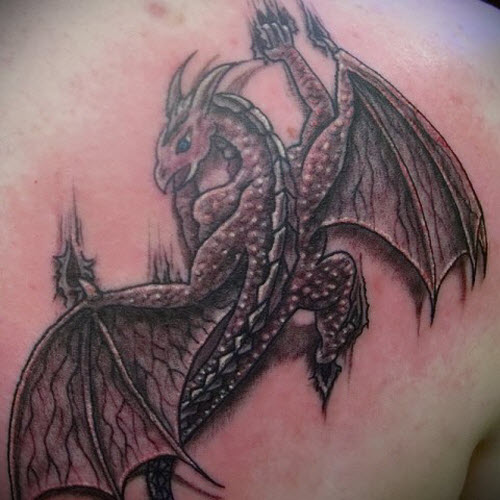 Фото тату дракона женское на лопатке - 0