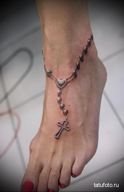 Фото тату крест на ноге девушки - 8