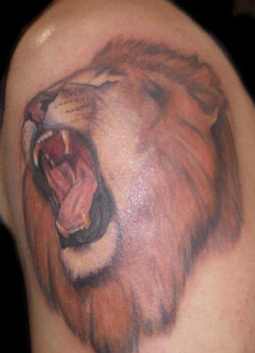 Фото тату на руке мужские льва - 8