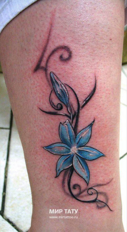 Женская тату цветок на ноге фото