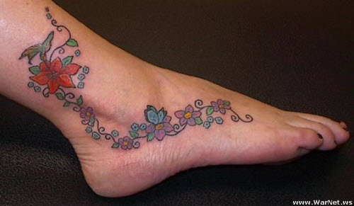 Женская тату цветок на ноге фото - 5