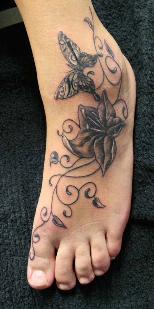 Женская тату цветок на ноге фото - 6