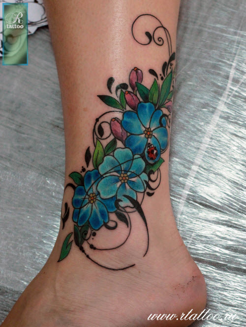 Женская тату цветок на ноге фото - 8