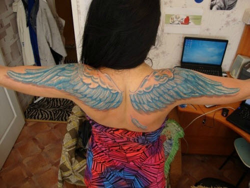 Женские тату на спине крылья фото - 0