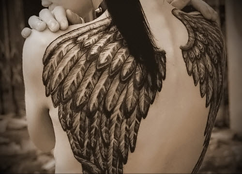 Женские тату на спине крылья фото - 1
