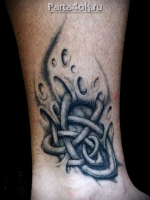 Кельтский узор тату на ноге фото
