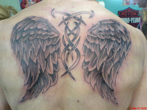 Крылья ангела на спине тату фото - 9